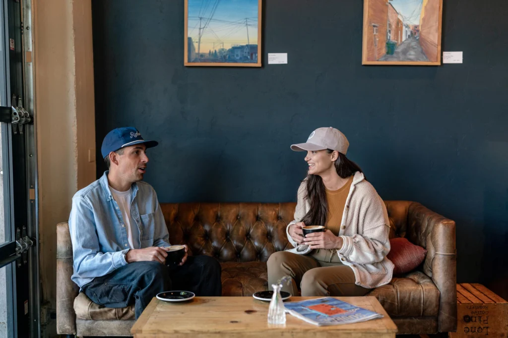 Two People In Cafe Wearing Custom Richardson Hat