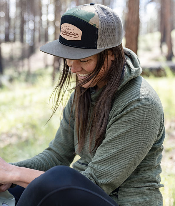 Woman In Woods Wearing Custom Decorated Richardson Hat