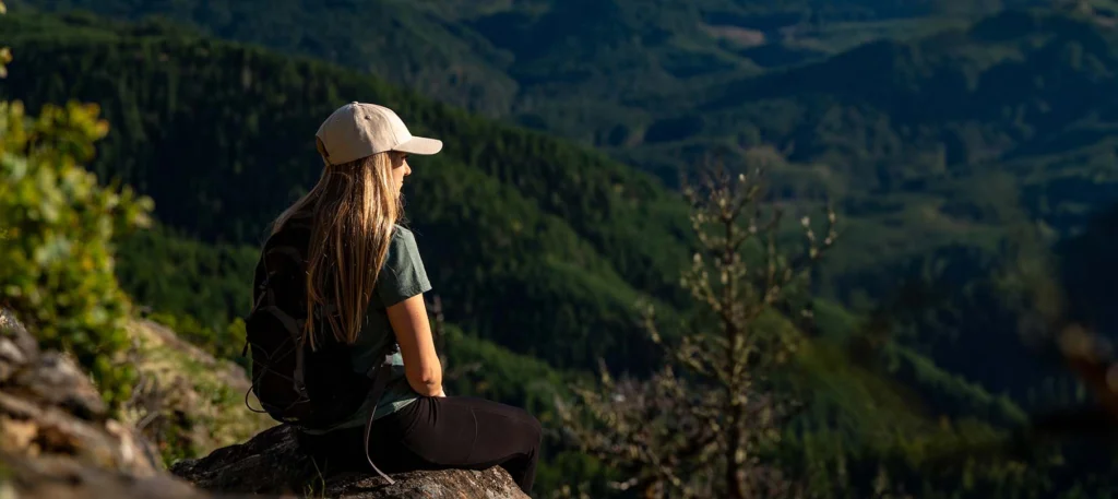 Woman Sitting Wearing Custom Decorated Richardson Hat