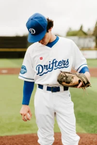 Baseball Player On Mound Wearing Custom Richardson Hat & Uniform